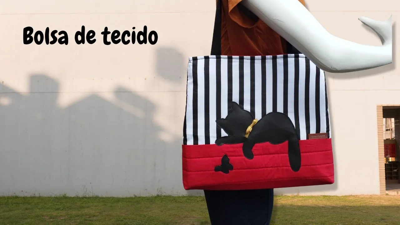 Bolsa de tecido com aplique de gatinho