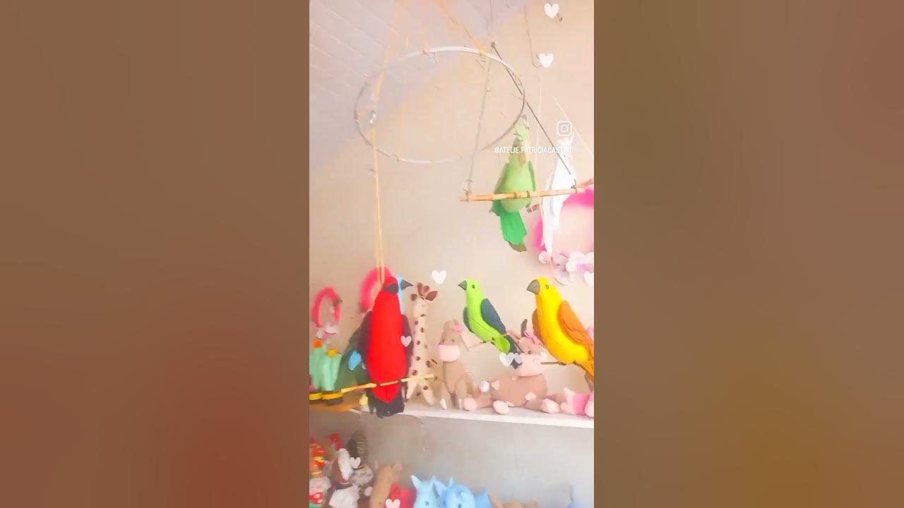 Pássaro colorido de tecido